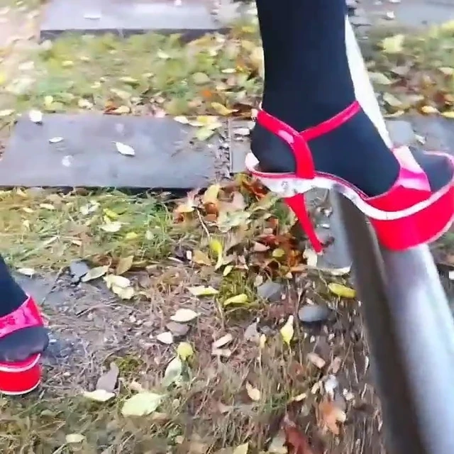 Lady L  red xtreme high heels .(video short version)