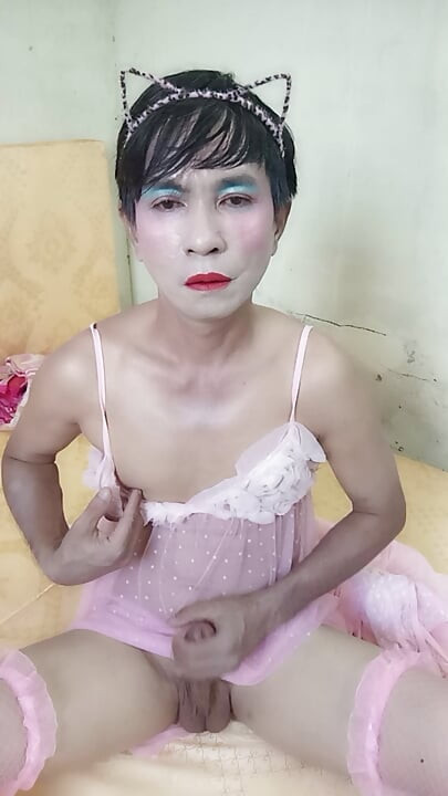 Oanh Le transgender wearing a sexy robe masturbating happily