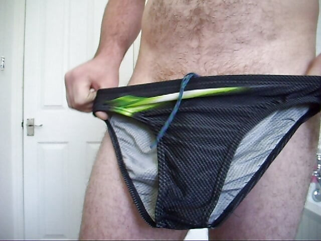 Trying on speedo and adidas swim trunks briefs. Masturbate and cum in speedo then put them on.