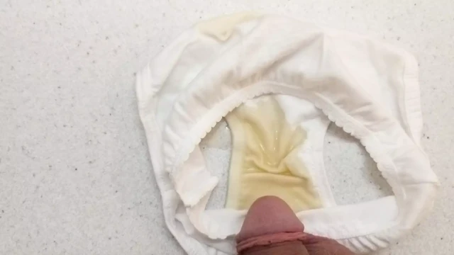 Rubbing myself on cute white panties again then peeing some more