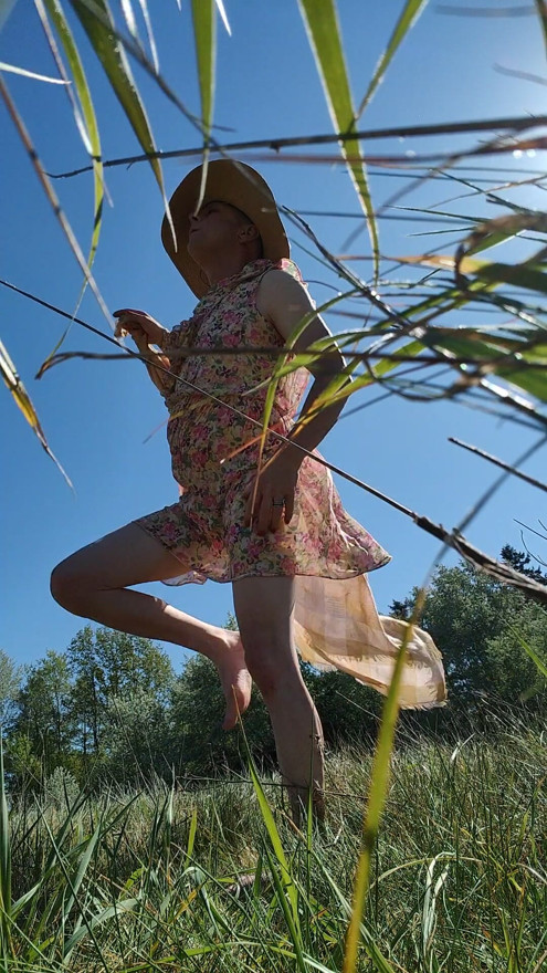 A little bit too much vino in the park. This naughty crossdresser lifts her dress and flashes her panties.