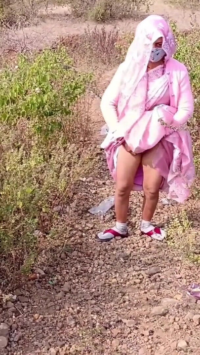 Sister-in-law is walking on the bridge by the roadside, getting down on the shore, sister-in-law started taking her clothes from the toilet and fingering her pussy. | Clip 1