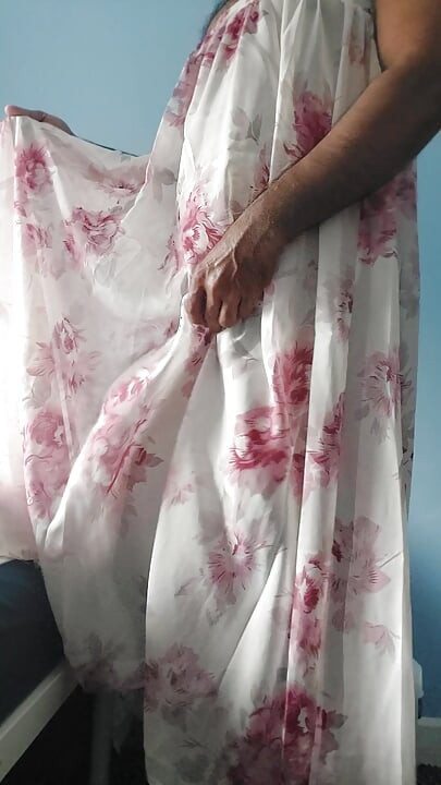 I'm masterbating in a flowery flowing silky seethrough fleard skirt and cum