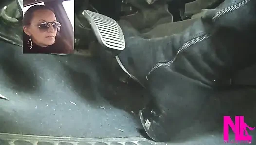 Mengemudi cepat dengan sepatu bot tinggi suede knee hitam