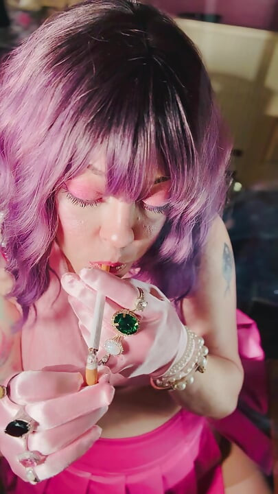 A Cute Tina Snua Tip To Tails 2 Cigarettes With Lots Of Smoke Rings In Satin Gloves & Jewellery