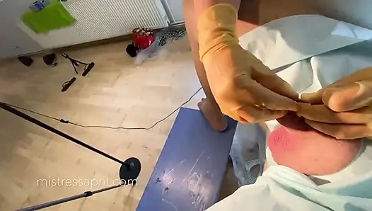 Dominatrix mistress April - clinical cock sewing