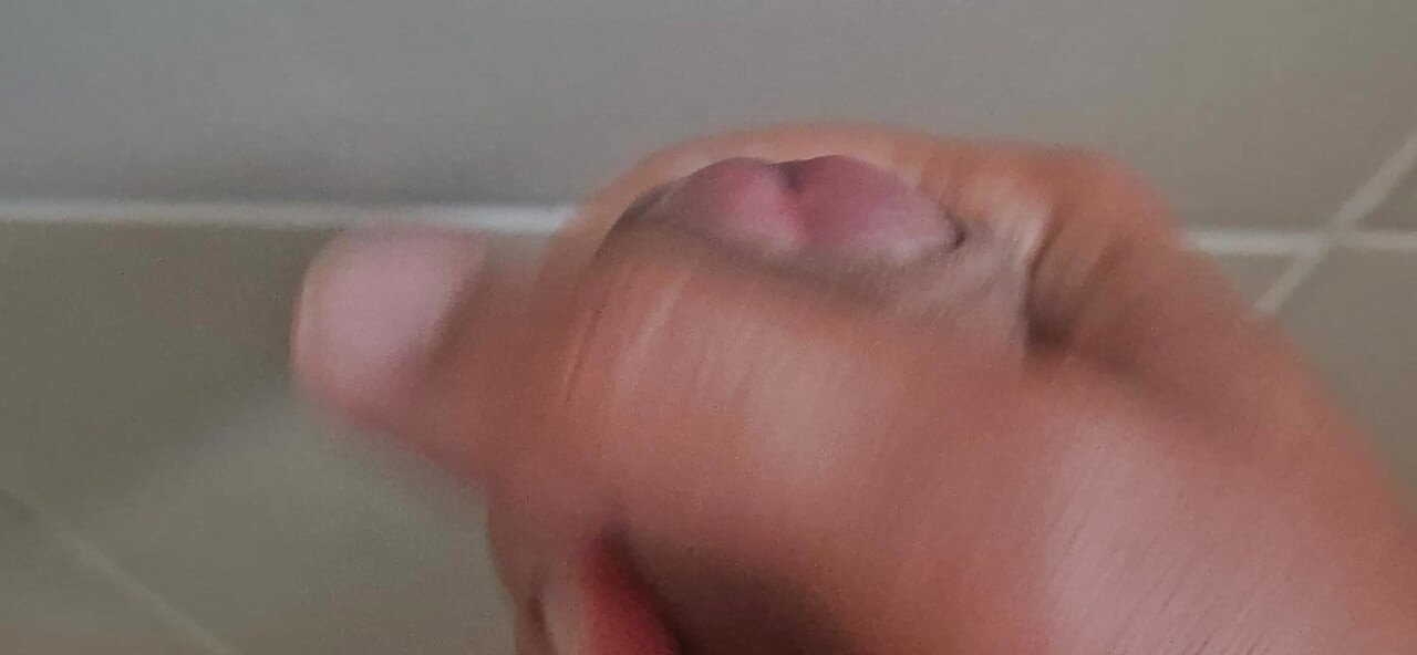 showing the pink head of my penis