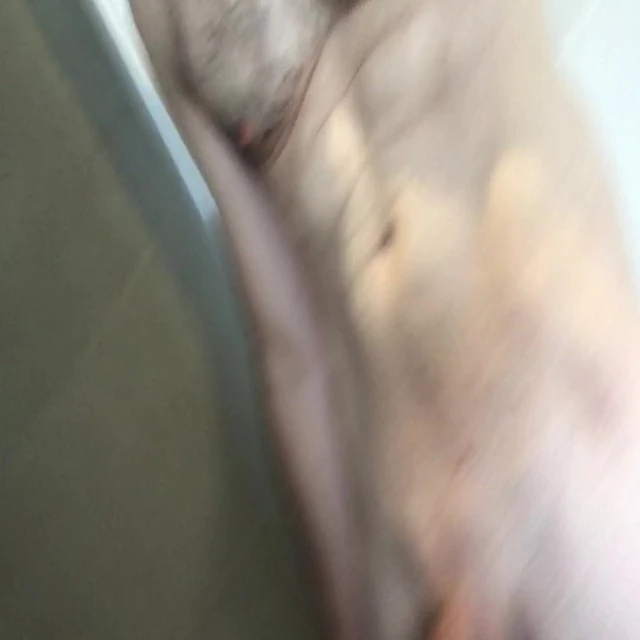 wanking and cumming in hotel shower in Berlin