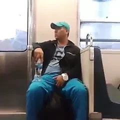 Str8 guy grabbing his bulge in metro