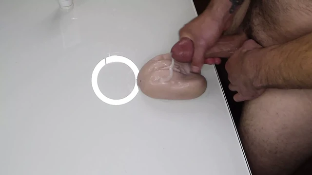 Big cumshot after fucking a sex toy