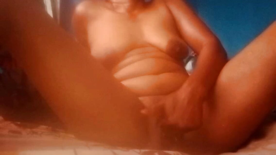She is addicted to fingering her wide pussy