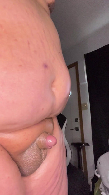 Iconic moment from "Oiled Up Chub Jerks and Shoots a HUGE Load"