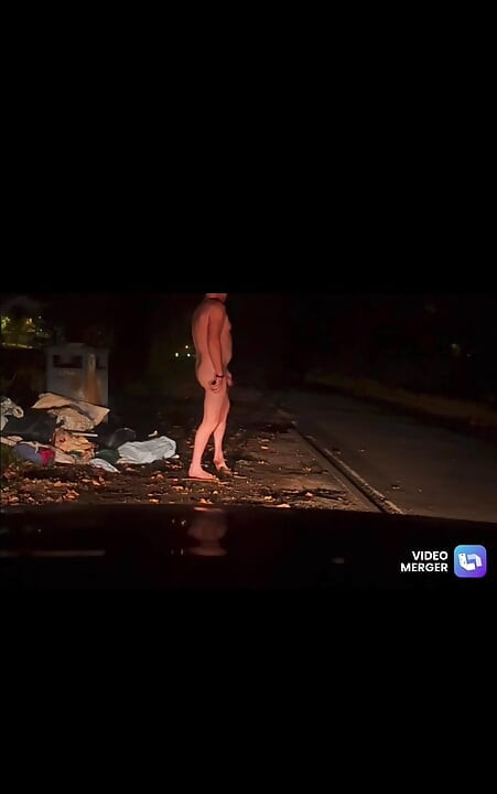 Naked in street hiding from passing cars