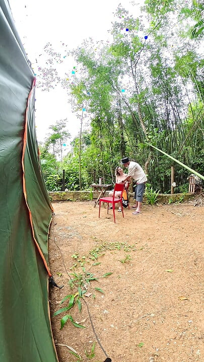 Strangers having sex at a public campsite.
