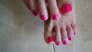 My fingers and fresh, bright pedicure