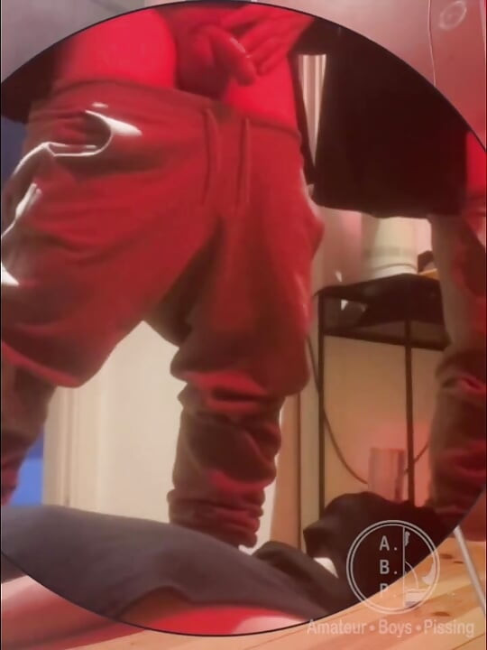 Amateur Boy Pissing in a Glass Held in His Friend's Mouth