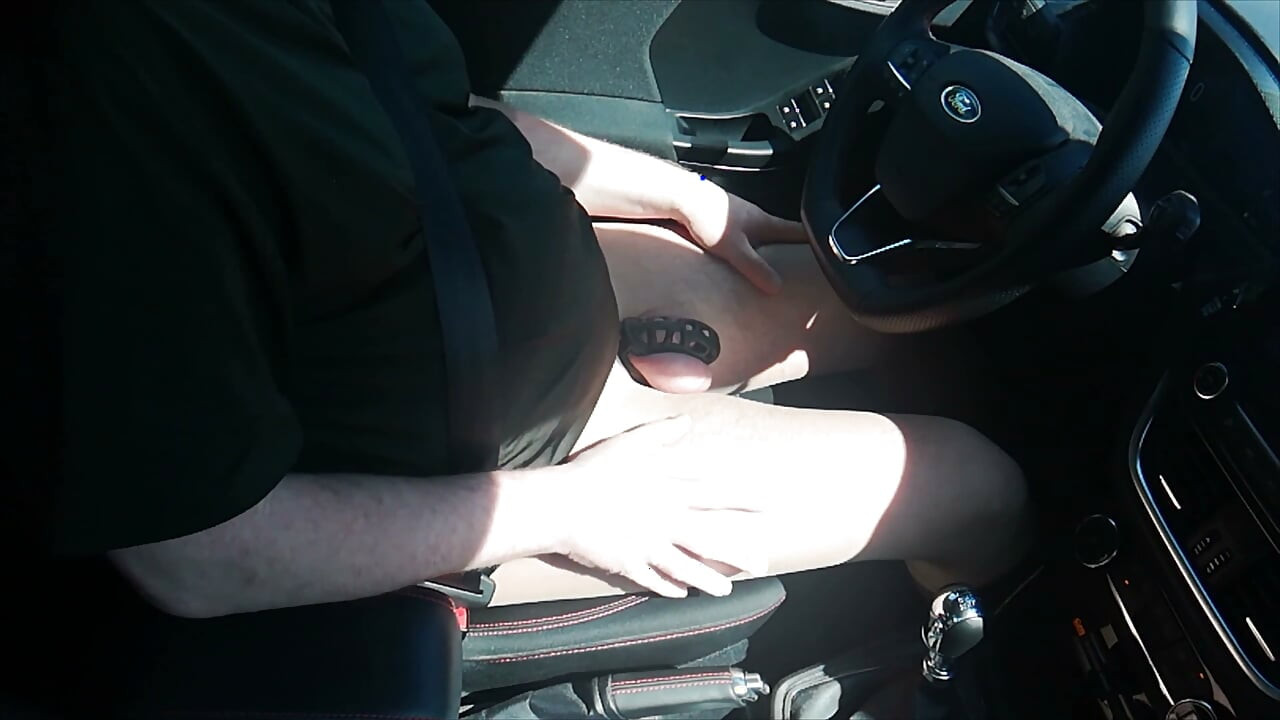Small Penis in Cage While Driving in Pantyhose