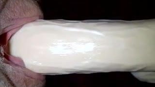 close up of dildo going into pussy