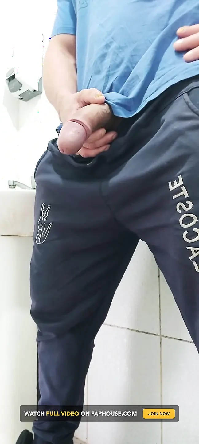 A Well-endowed Brazilian Man Urinating and Showing His Thick Penis to His Female Friends.