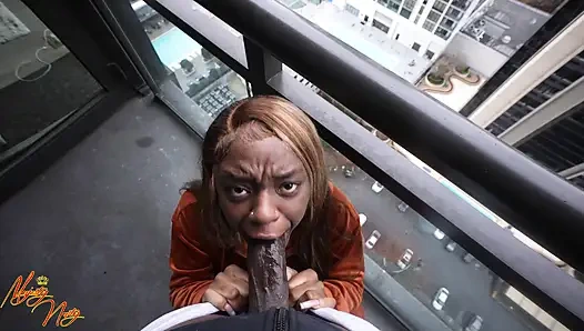 Ebony sucks BBC on balcony