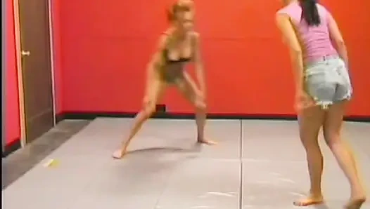 Big boobed ginger slut fucks a hot babe in the ring