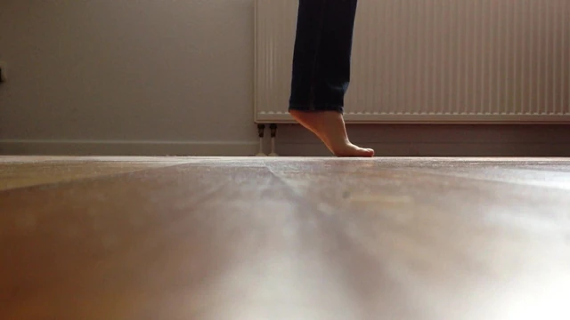 Hopping on one naked foot