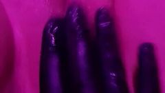 Latex glove pussy massage under pink lights