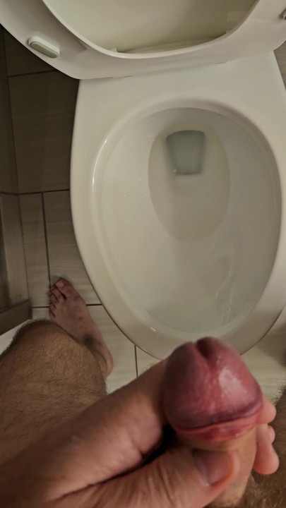 Hard small uncut dick peeing