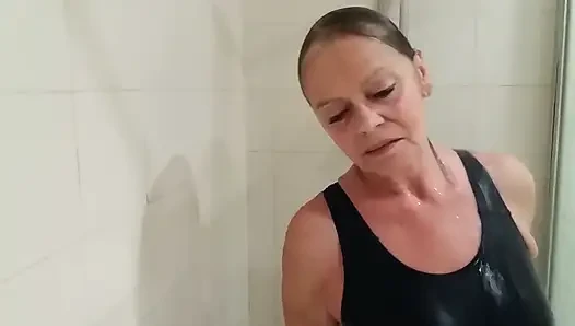 Grandma in a Tight Swimsuit Taking a Shower!