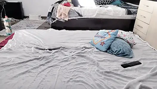 Sexy brunette doing naked chores around the house.