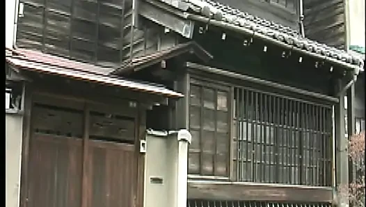 P128G05 A sensual erotic drama set in the ordinary Showa-era cityscape, where a gentle mother is embraced by a man in front of d