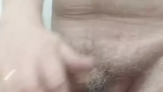 En la mano