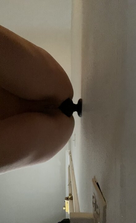 Trying to take a huge butt plug.