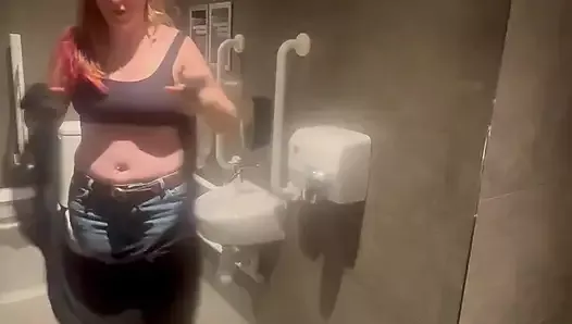 Stepmom joins horny stepson in cinema toilet to help release his big build up flashes him and sucks his Cock