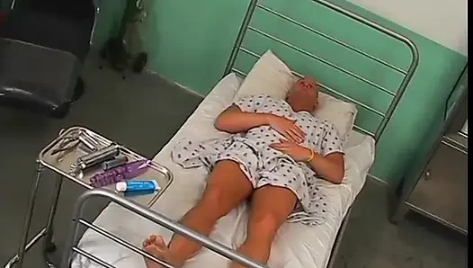 Hot blonde nurse sticks a thermometer in guy's ass in operation room