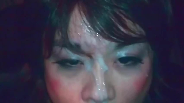 Asian CD sucking cock