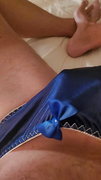 Masterbating in blue silk panties.