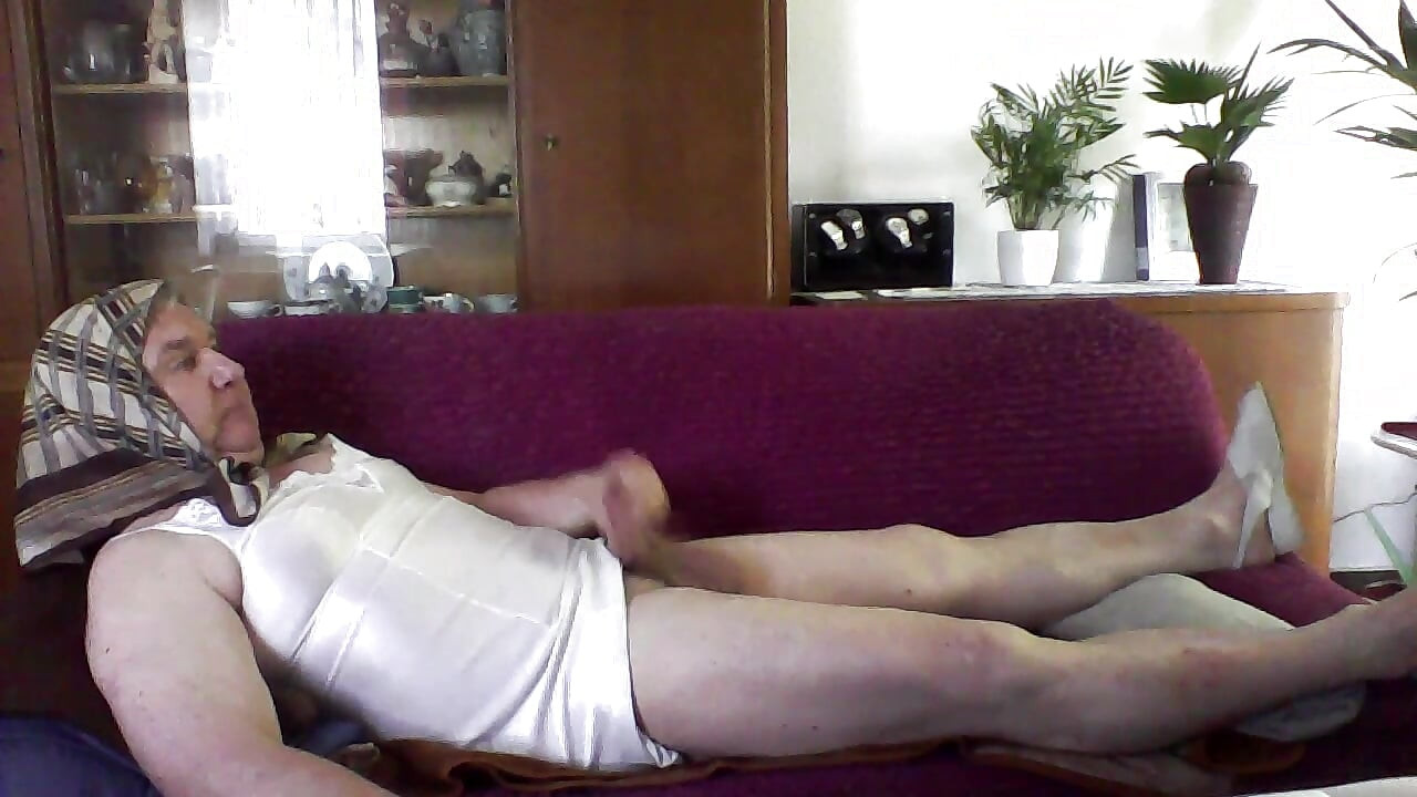 Andreas Jerks off with a Headscarf and Underskirt