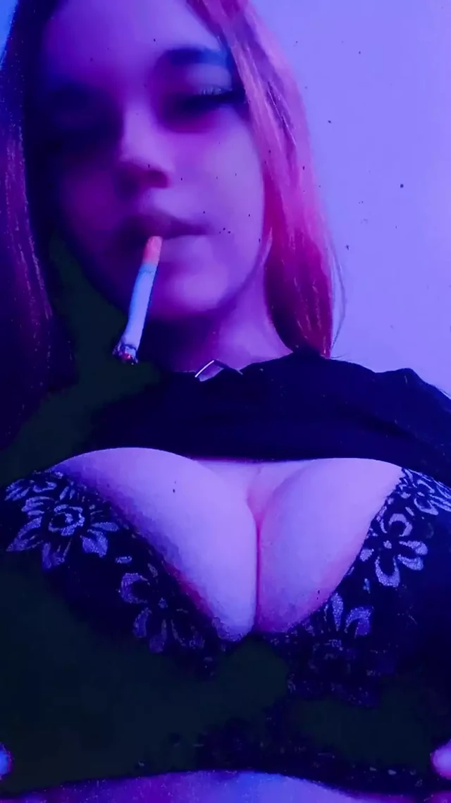 Hot blonde fingering her big tits in the bathroom