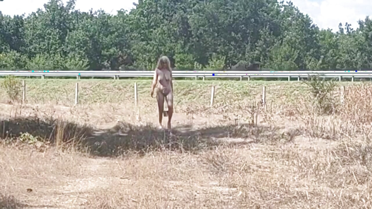 The Slave Girl Is Punished with Buckets of Pussy and Tits to Show off to the Drivers.