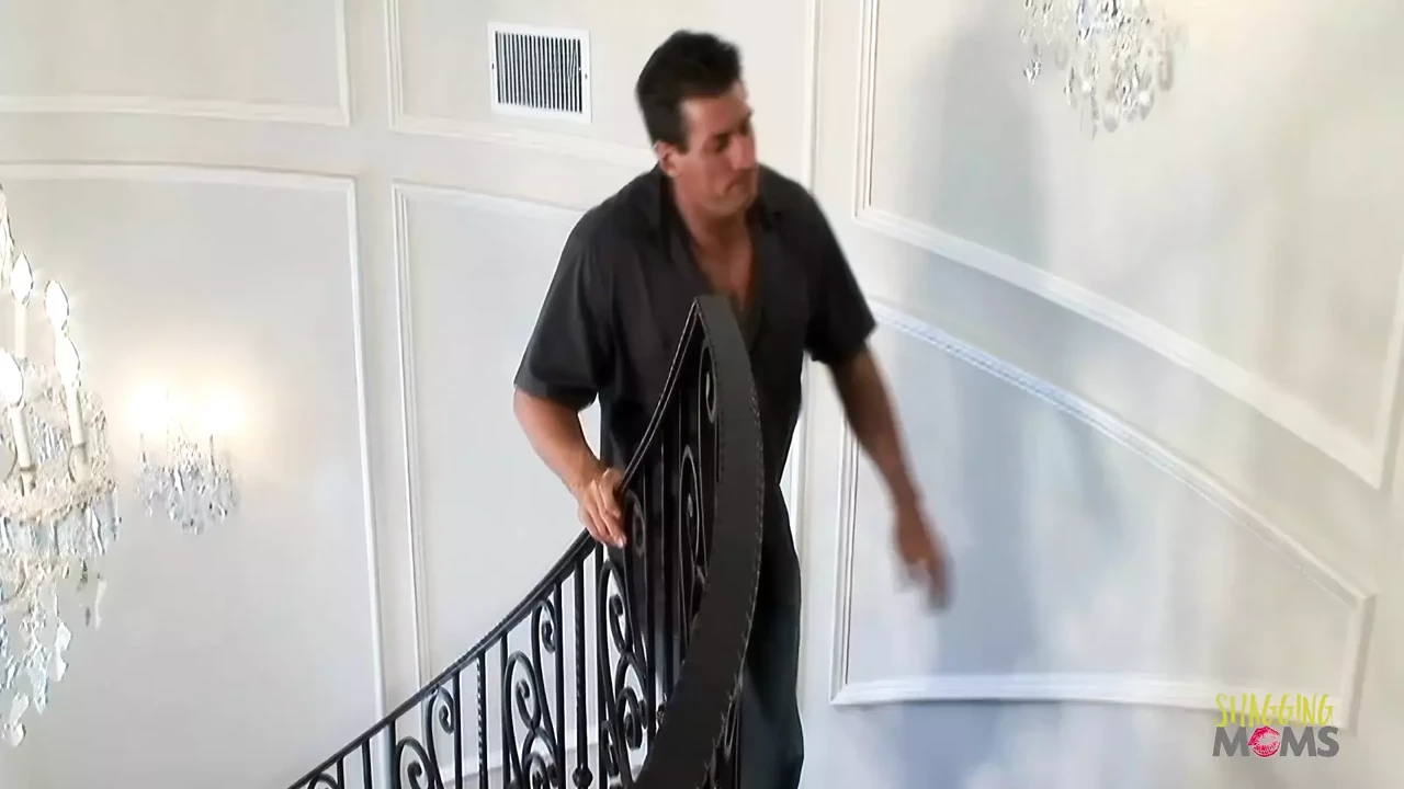 A knock on the door arouses intense and sensual sexual activity with large artificial breasts.