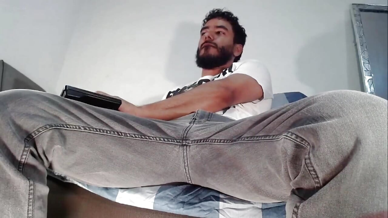 Macho Latin Stud Strips and Jerks His Uncut Cock for You