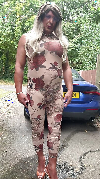 Sexy Crossdresser kellycd2022 in sexy floral see thru catsuit and heels