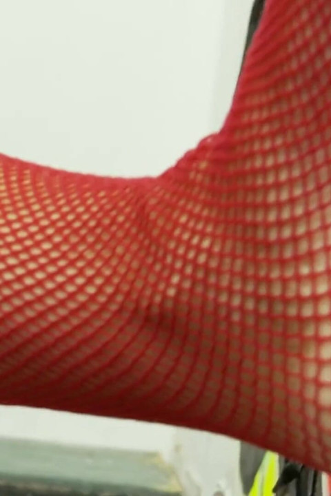 Dirty brunette in fishnets gets banged by a dick through a glory hole after sucking it