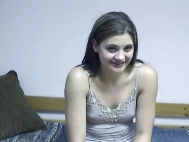 Horny chick masturbates with food on a couch