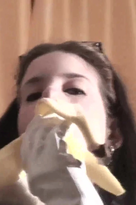 Spex brunette talking dirty while eating banana