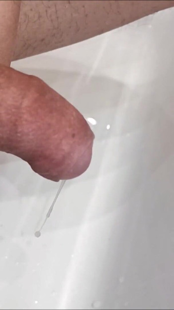 Must-share moment from "Slow motion flooding cumshot, cumming with a ball stretcher"