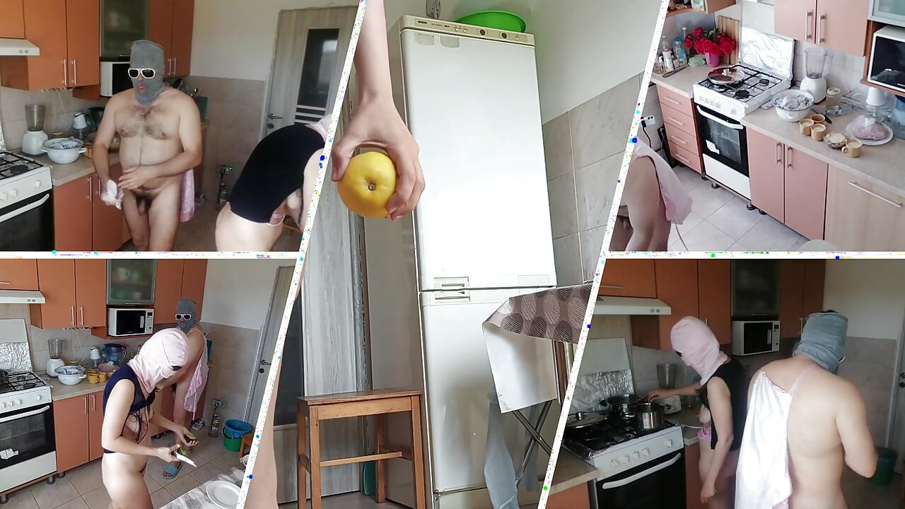 Amateur couple having fun in the kitchen. A sexy hairy brunette does the housework naked.