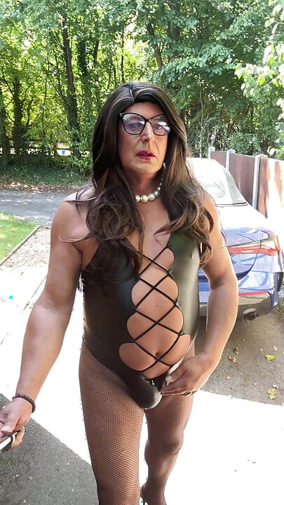 Sexy Crossdresser Kellycd2022's in black pvc bodysuit and fishnet pantyhose