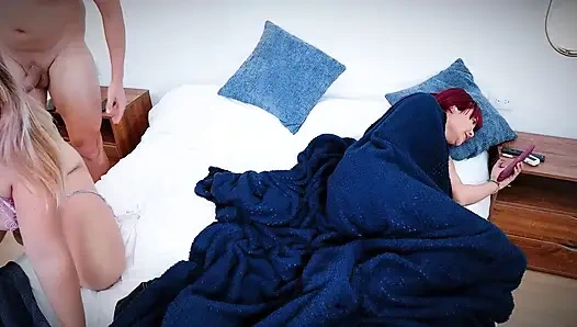 My stepsister shares her penis with me on the same bed while she takes a call